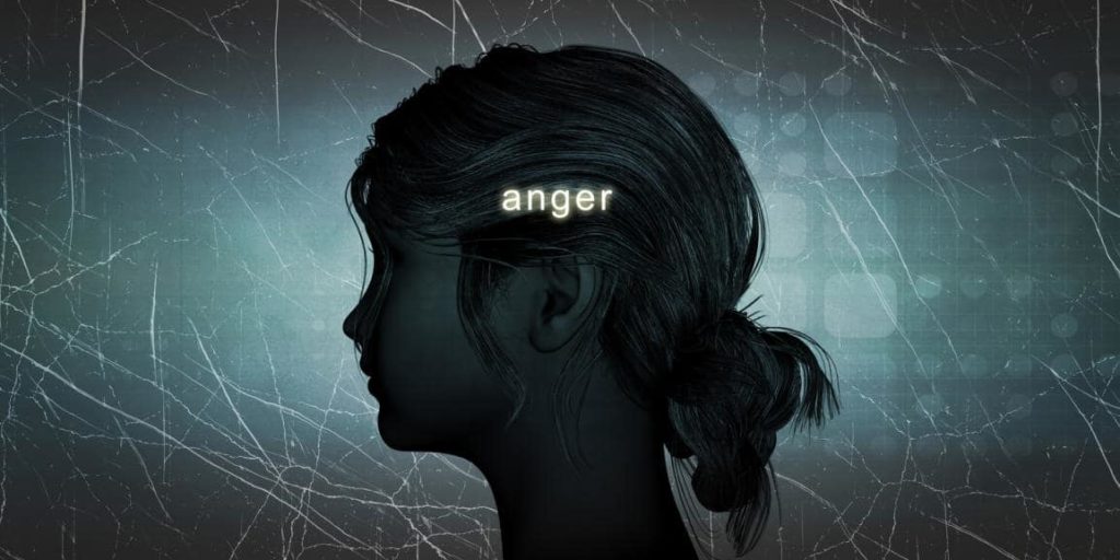 illustration of a woman in the dark with the word anger tranposed on top of her head