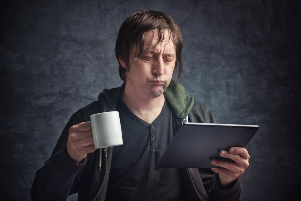 man reading social media in recovery from addiction