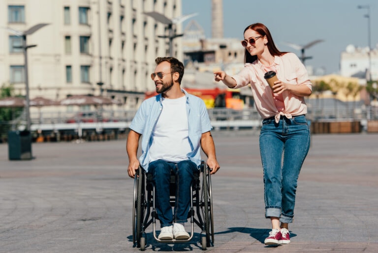 man with disability and friend